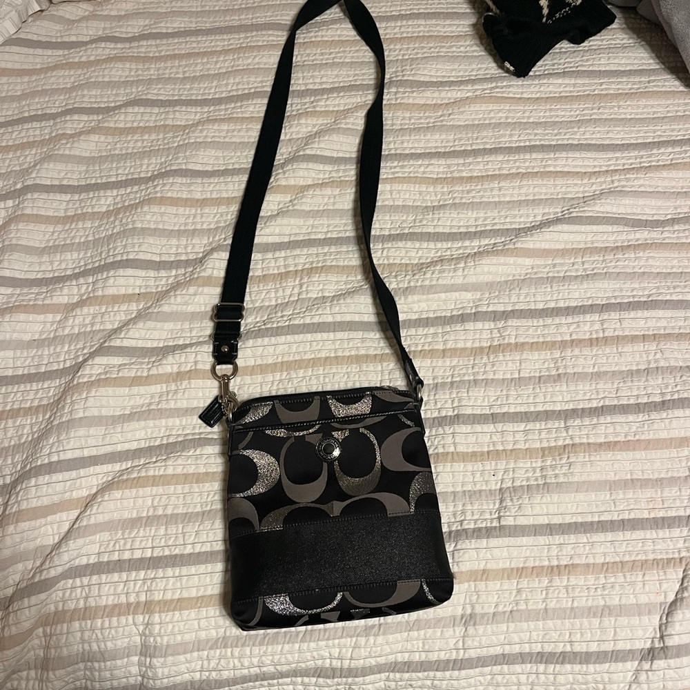 Coach crossbody, hardly used, in great condition. Smoke free, pet free home.